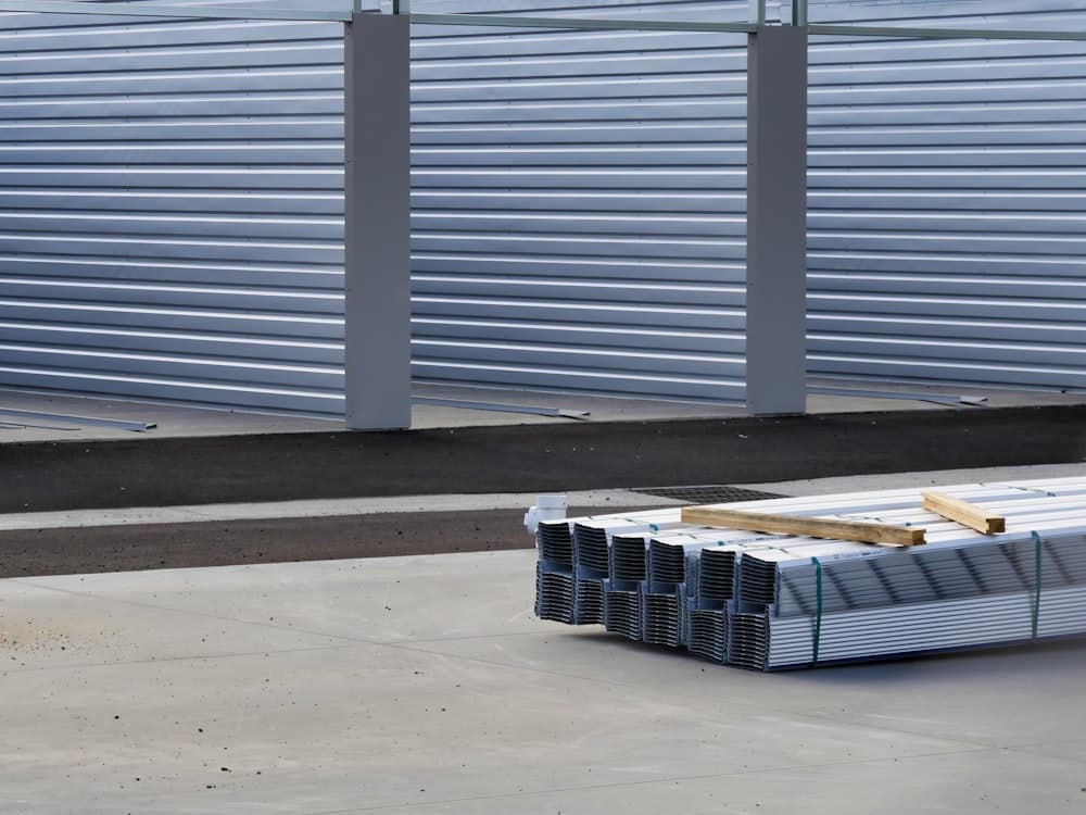 Row of drive-up storage units with roller doors